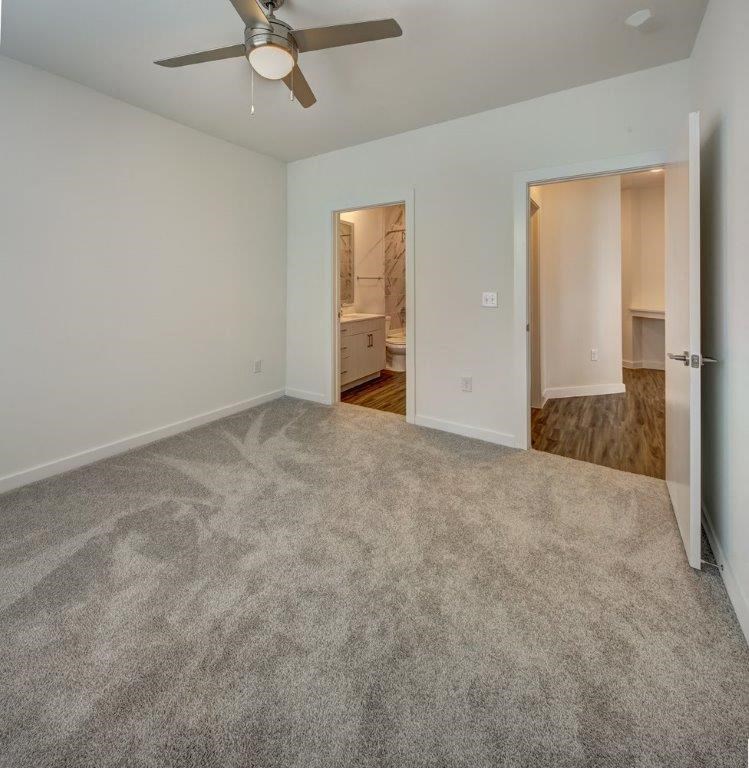 master bedroom with carpet at Brixton South Shore, Austin, Texas