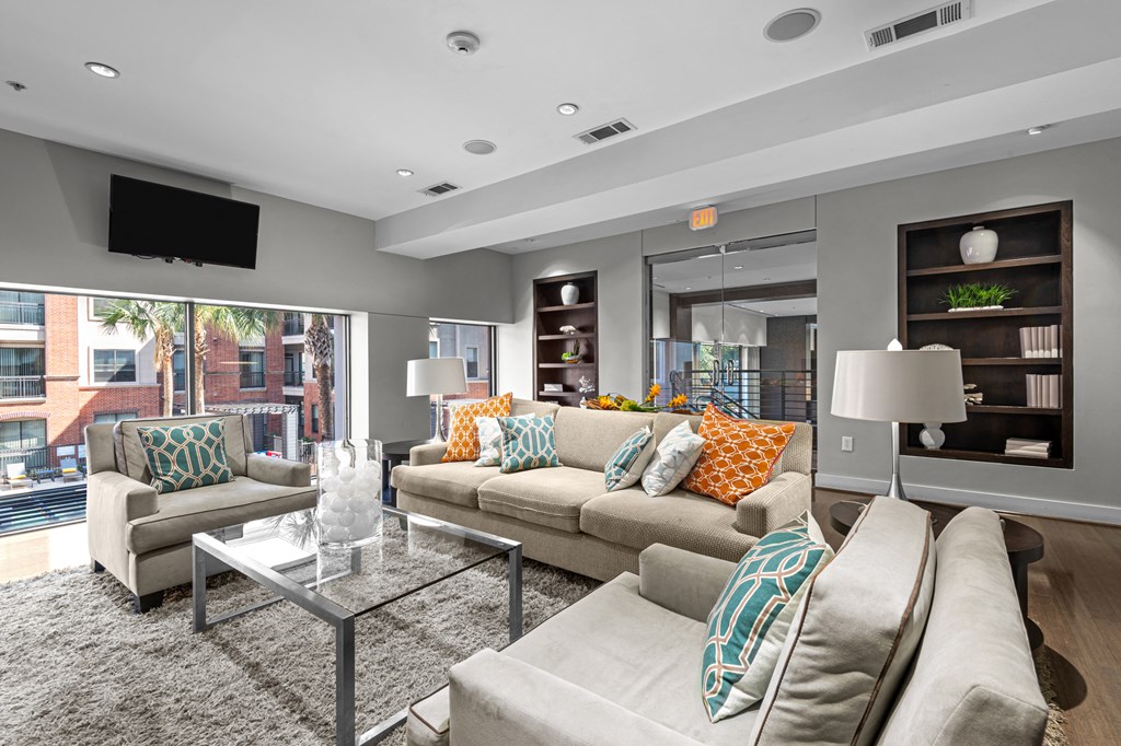 a living room with couches and a coffee table