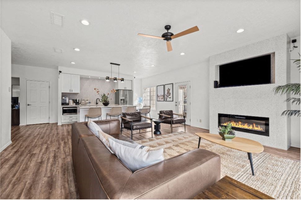 a living room with a couch and a fireplace