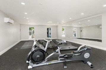 a room filled with lots of exercise equipment