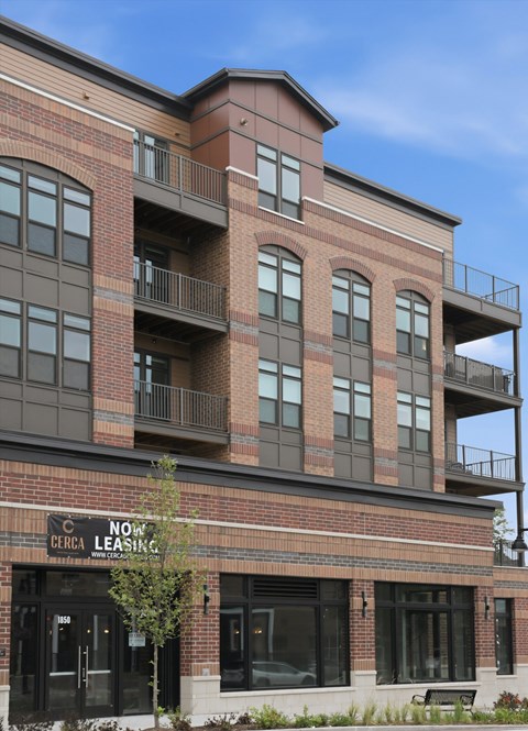 A building with a sign that says "CERA LEASING" on the front.