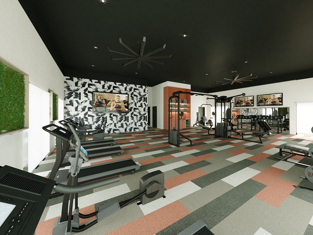 a gym with exercise equipment and a checkered floor