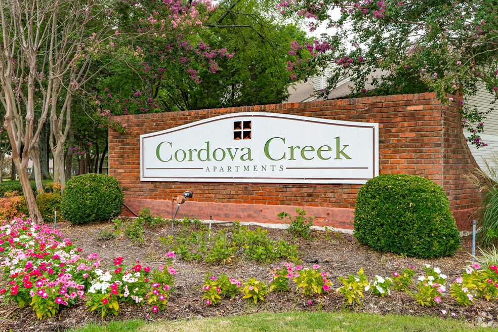 cordova creek apartments in front of flowers