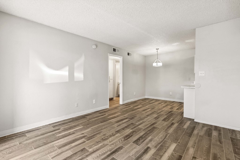 the spacious living room and dining room of our studio apartments atrium