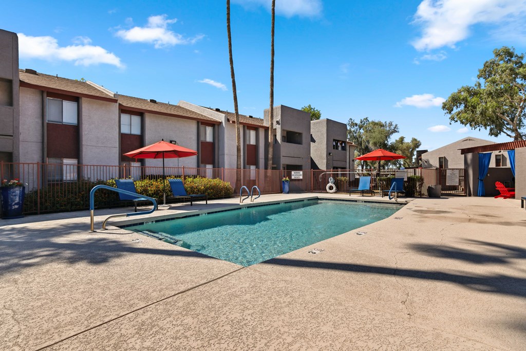 our apartments have a resort style swimming pool with umbrellas