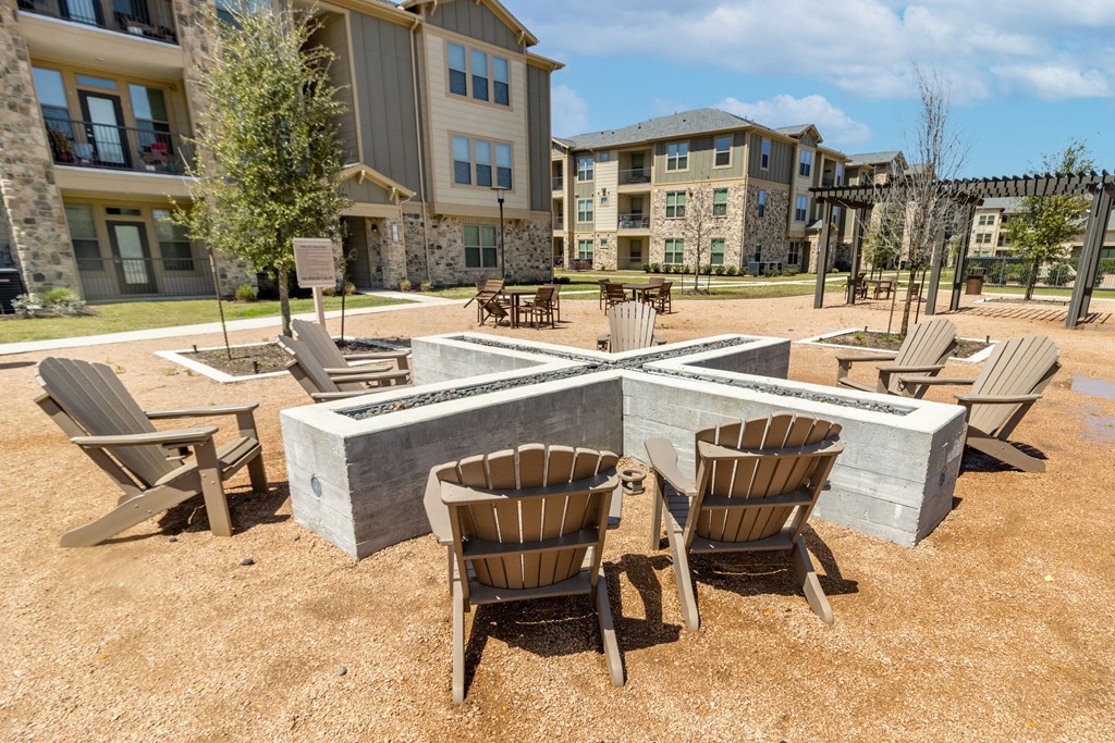 our apartments offer a clubhouse with a fire pit