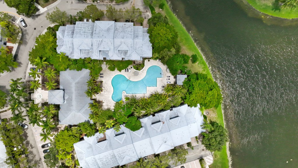 a birds eye view of the resort with a swimming pool