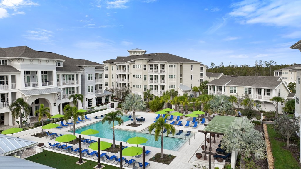 an aerial view of the pool at the resort at longboat key club