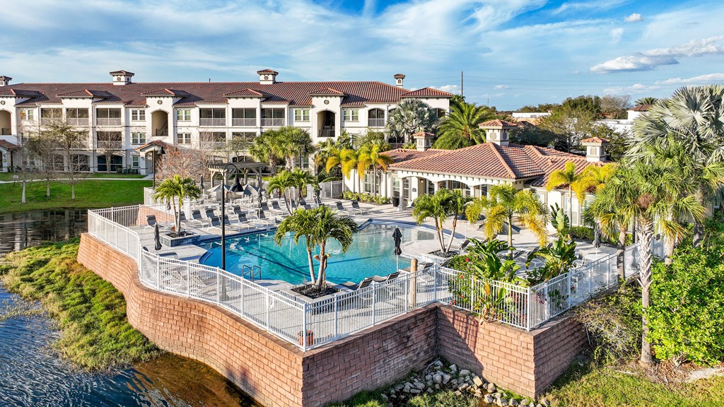an aerial view of the pool at the resort at longboat key club