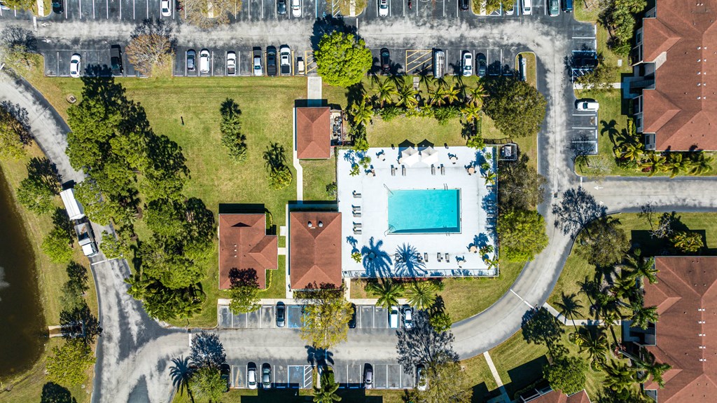 arial view of a house with a swimming pool