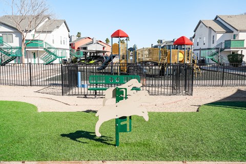 a playground with a dog painted on the ground
