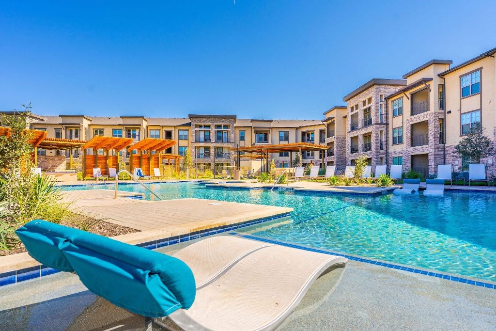 sunny day at resort style pool in midland texas apartment