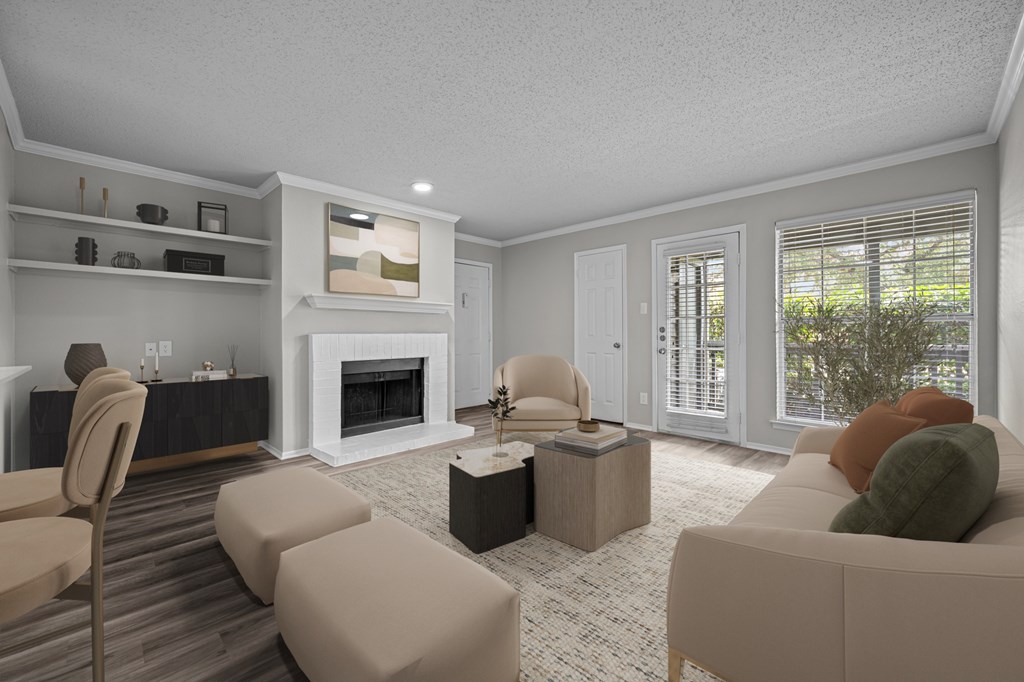 A living room with a fireplace and a couch.