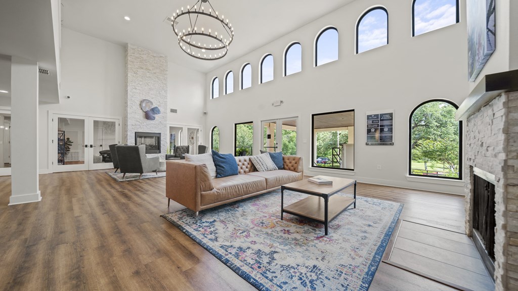 a living room with a fireplace and a couch