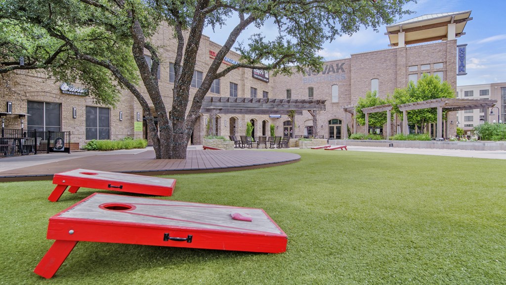 a picnic table in front of a building
