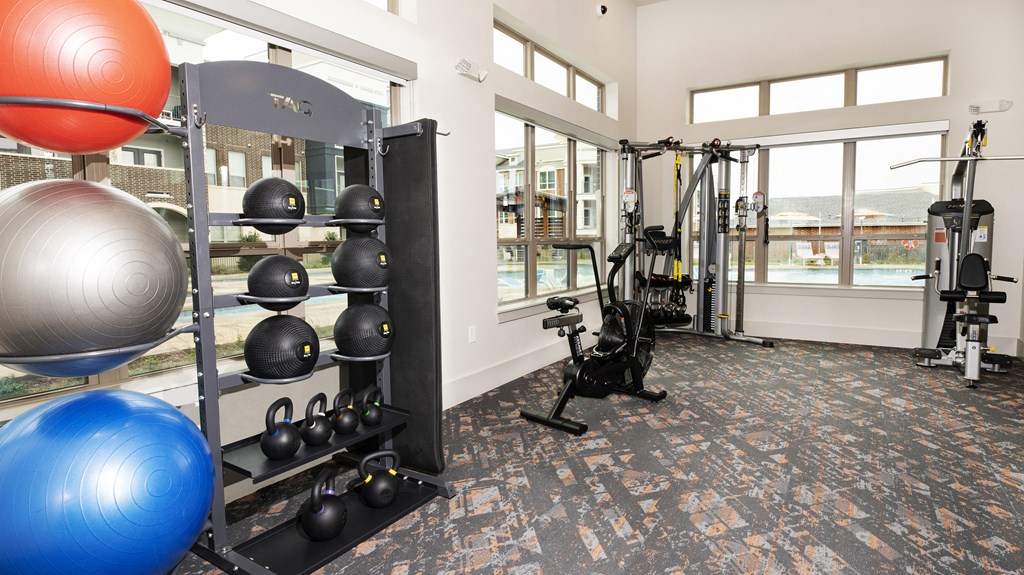 the gym at the flats at big tex apartments