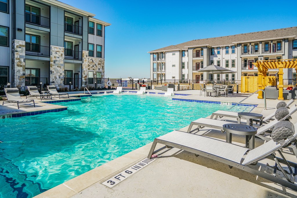 our apartments have a resort style pool with lounge chairs