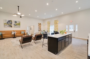 Clubhouse showing kitchenette and seating areas. - Photo Gallery 31