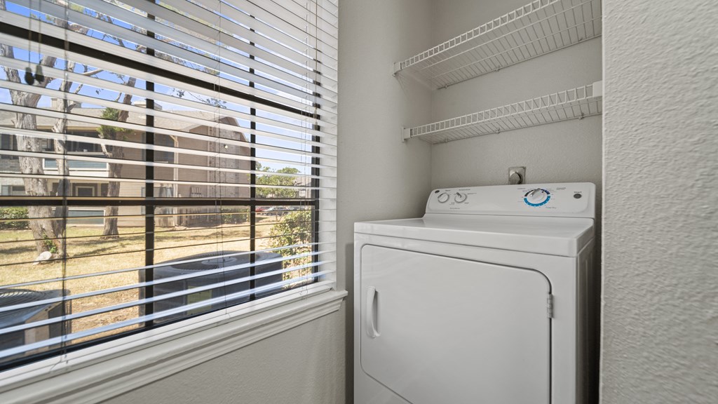 a washer and dryer are available in the laundry room