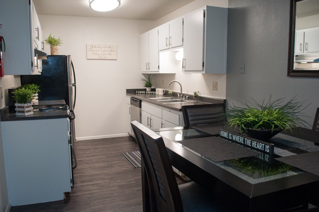 a kitchen and dining area of an apartment