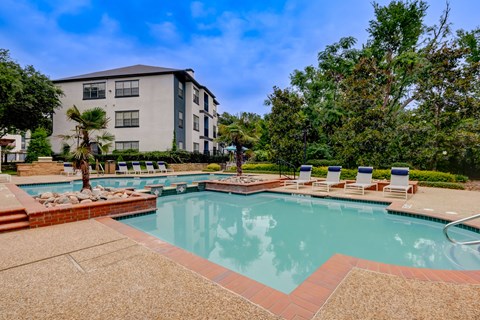our apartments have a resort style pool with lounge chairs