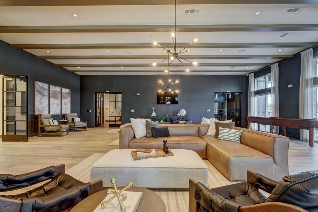 a large living room with couches and a coffee table