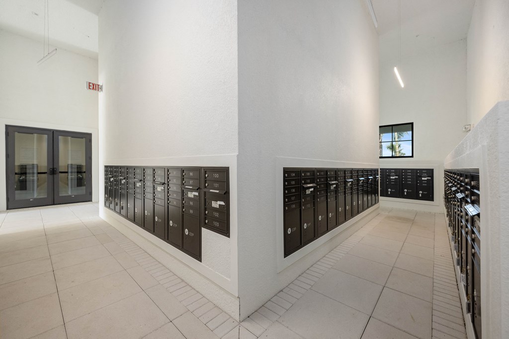 a view of the mailboxes at the base of the building