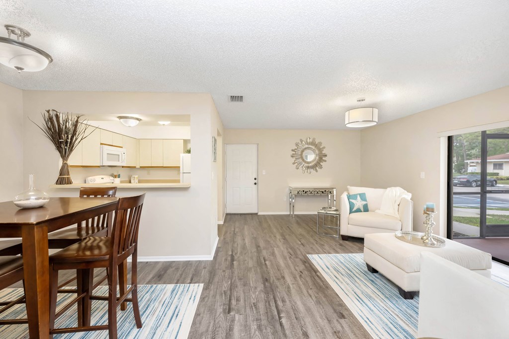 a living room with a couch a chair and a table