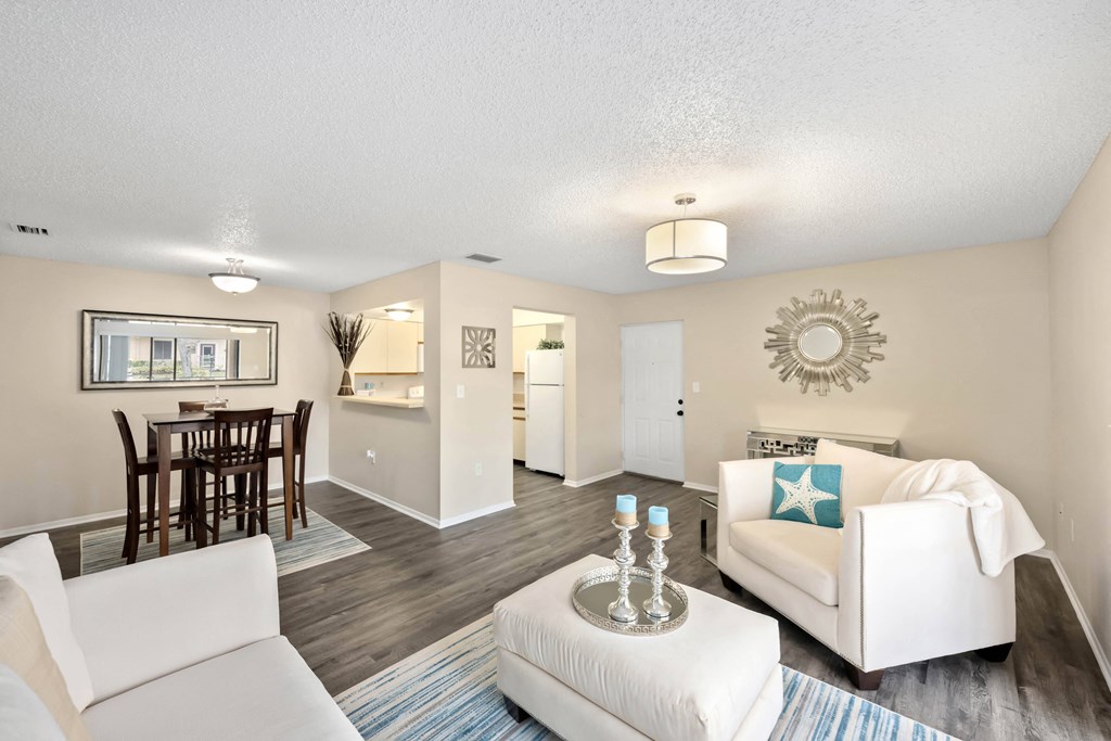 a living room with a couch and a chair