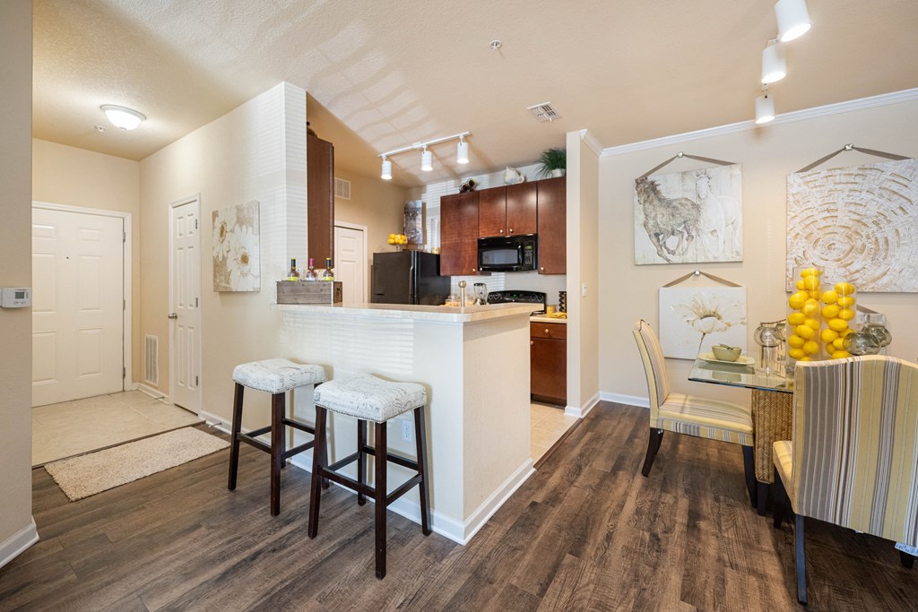 A bar seating area with bar stools