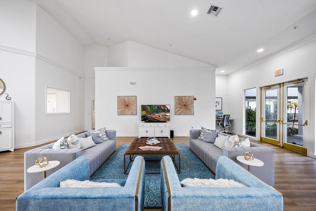 a living room with couches and a coffee table
