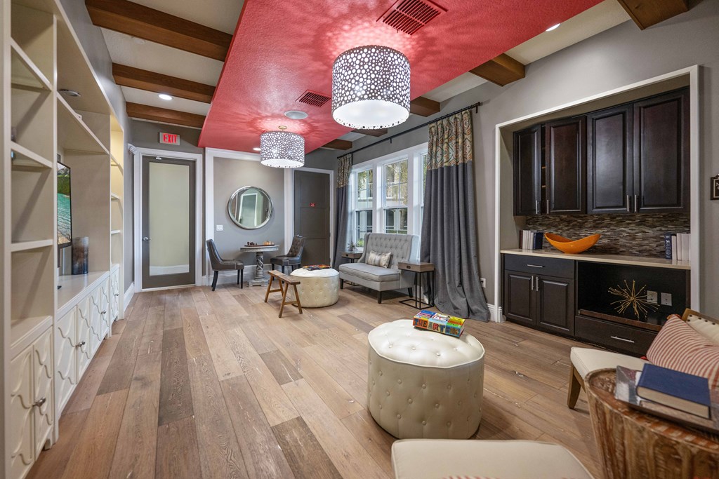 a rendering of a living room with tables and chairs