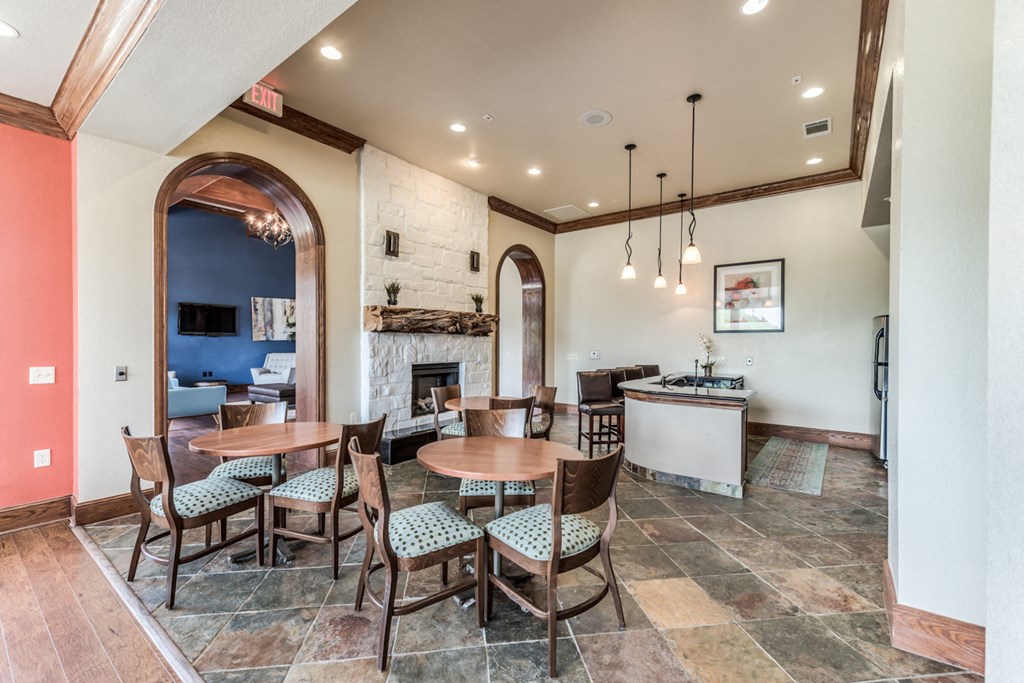 Fireplace view with kitchen