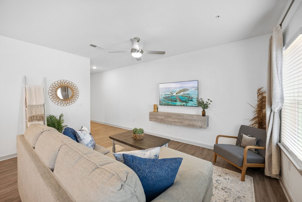 a living room with a couch and a chair