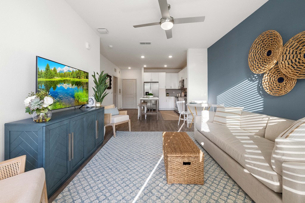 a living room with a couch and a tv
