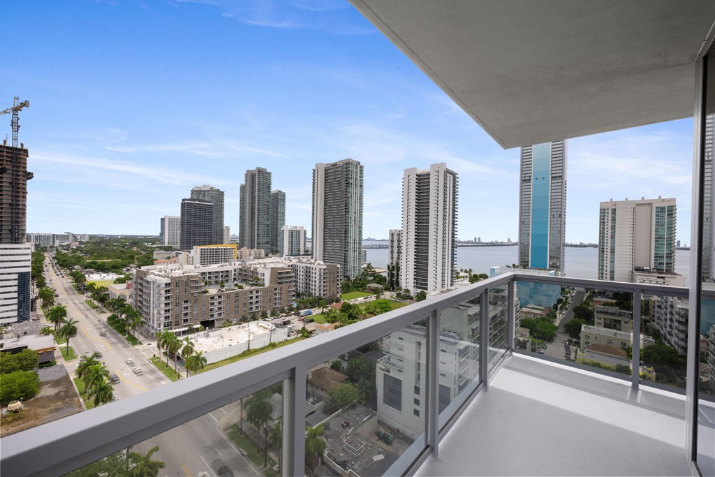 a view of the miami skyline from a balcony