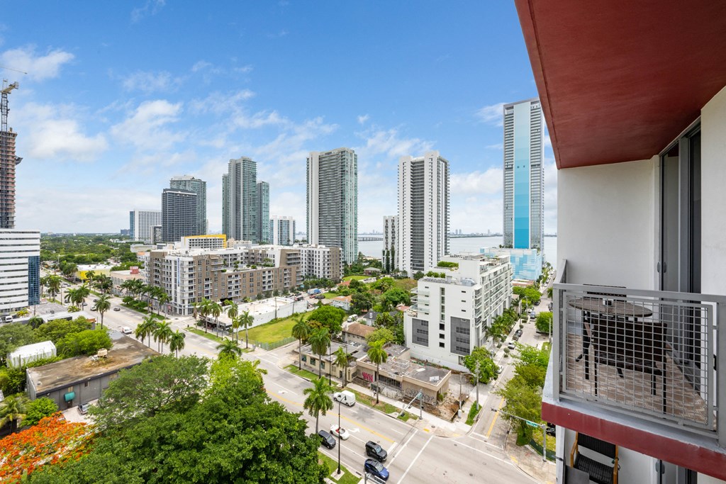 a view of the miami skyline from a balcony