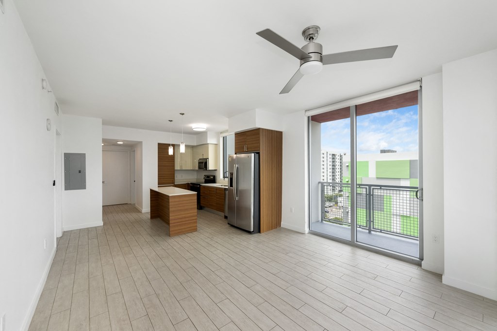 a living room and kitchen in a 555 waverly unit