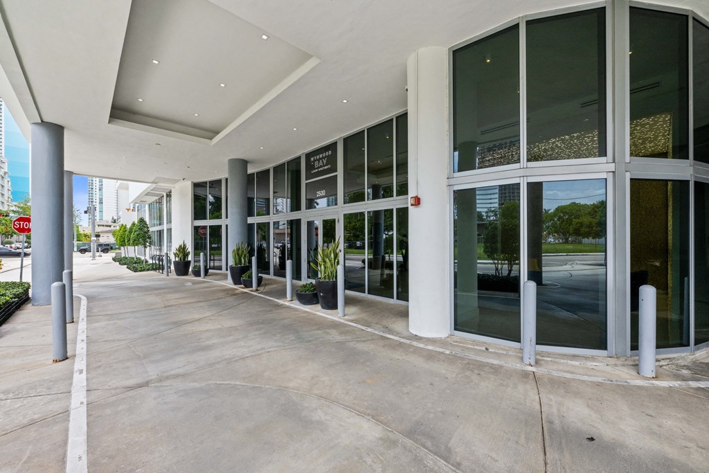 an empty parking lot in front of a building