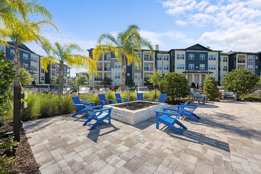 an outdoor patio with a firepit