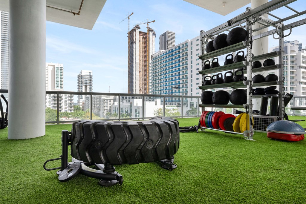 a gym with a view of the city