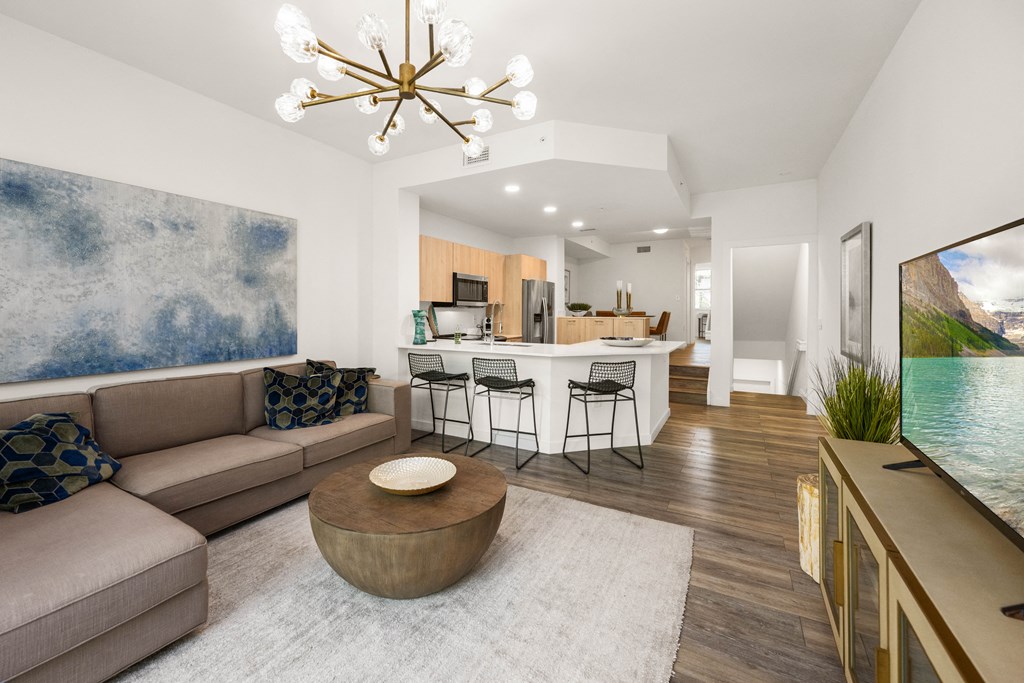 a living room with a couch and a table