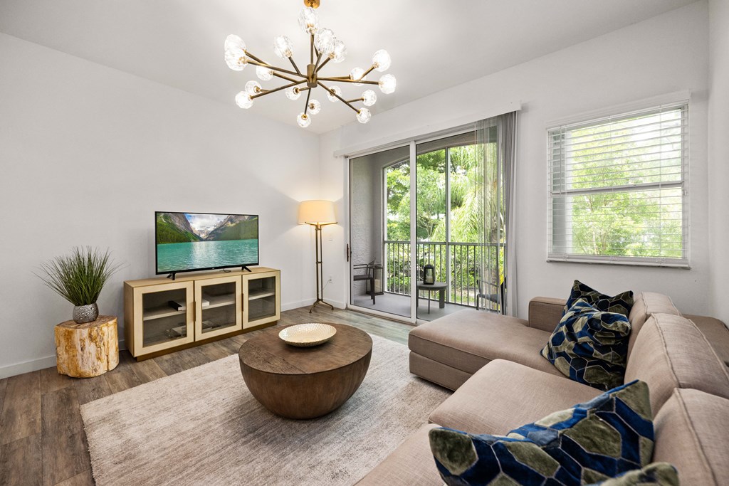 a living room with a couch and a tv