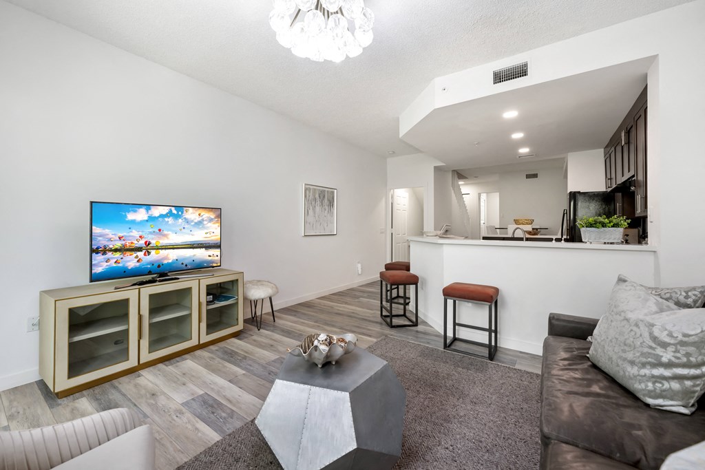 a living room with a couch and a tv