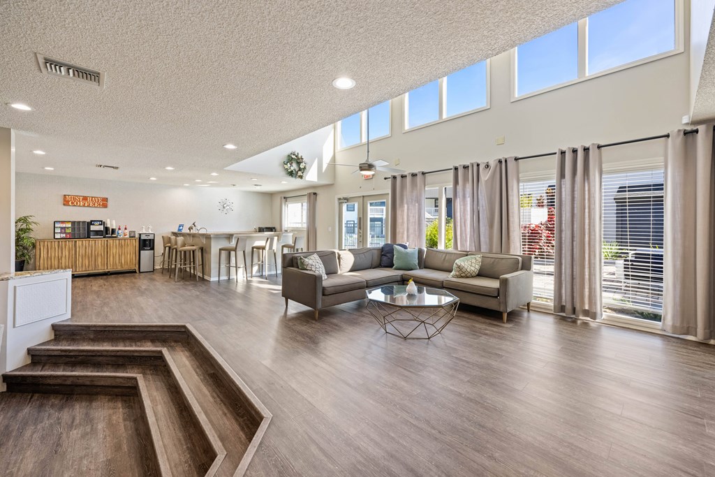 a living room with a couch and a coffee table