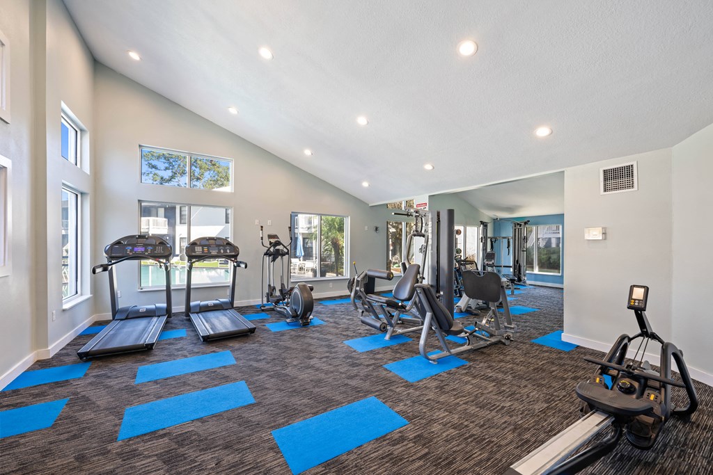 the preserve at ballantyne commons fitness room with exercise equipment and windows