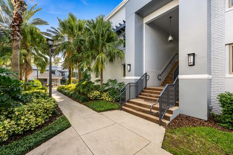 the preserve at ballantyne commons apartments entrance with stairs and palm trees