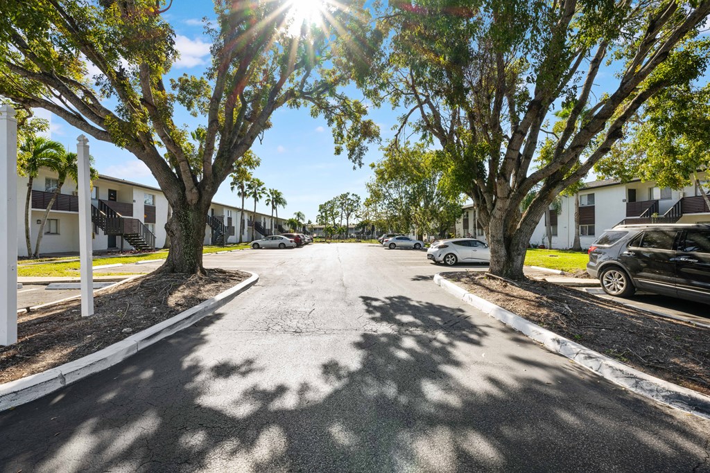 a street with houses and trees on both sides of it