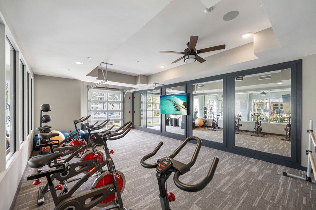 the gym at the district flats apartments in lenexa