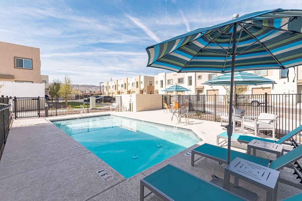 our apartments have a resort style pool with umbrellas